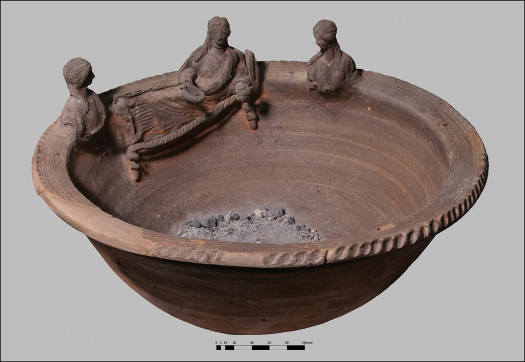 Incense burner decorated with appliqués of women