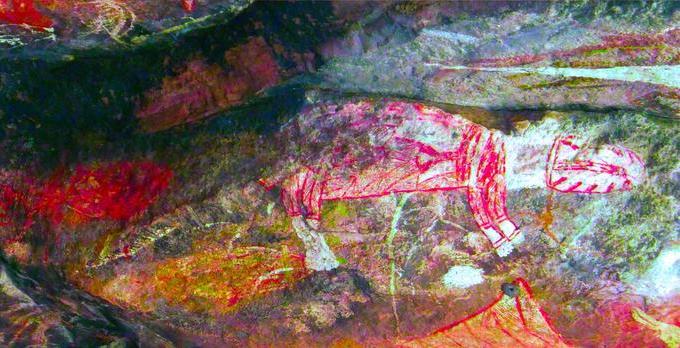 Red and white painting of a thylacine in the main gallery, Injalak Hill, Australia