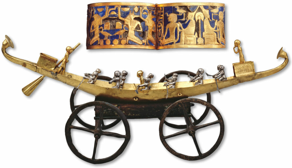 Hinged gold bracelet inlaid with lapis and gold boat model