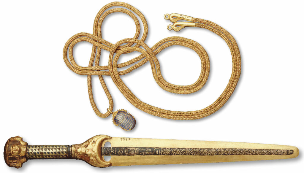 Gold chain and gold dagger