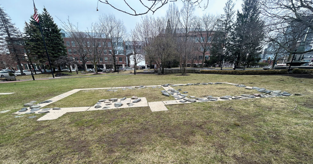 The outline of the foundations of the Three Cranes Tavern as it appears today