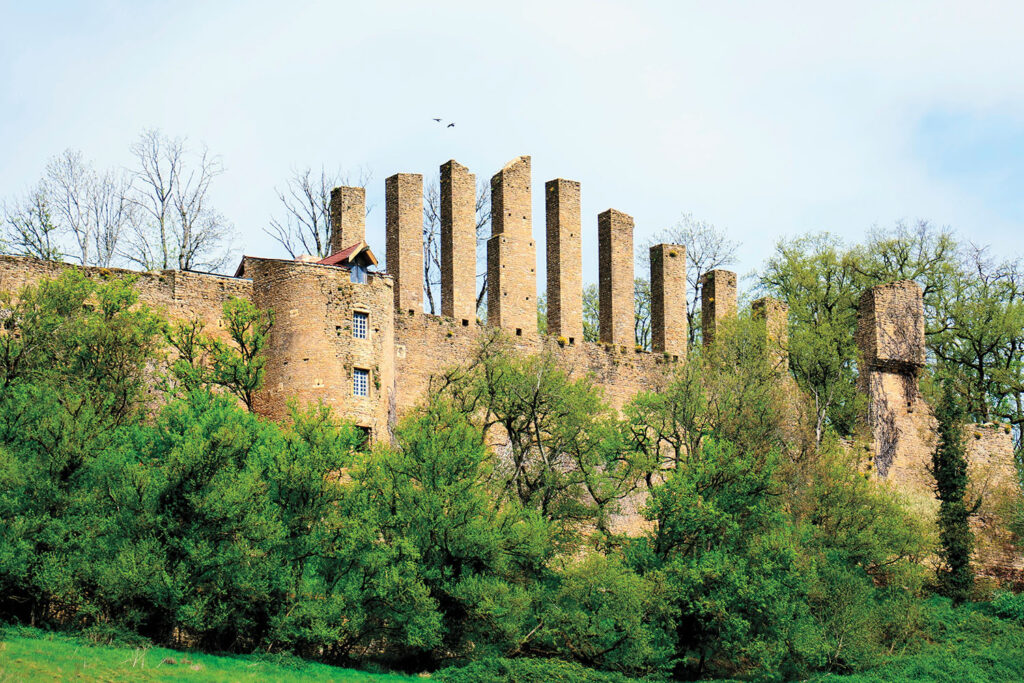 The soaring exterior wall of the jeu de paume court at Lourdon Castle