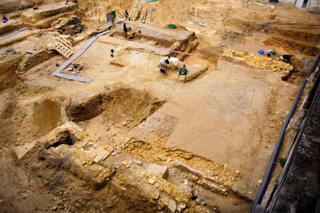 Archaeologists excavating the jeu de paume court of Louis XIII at Versailles
