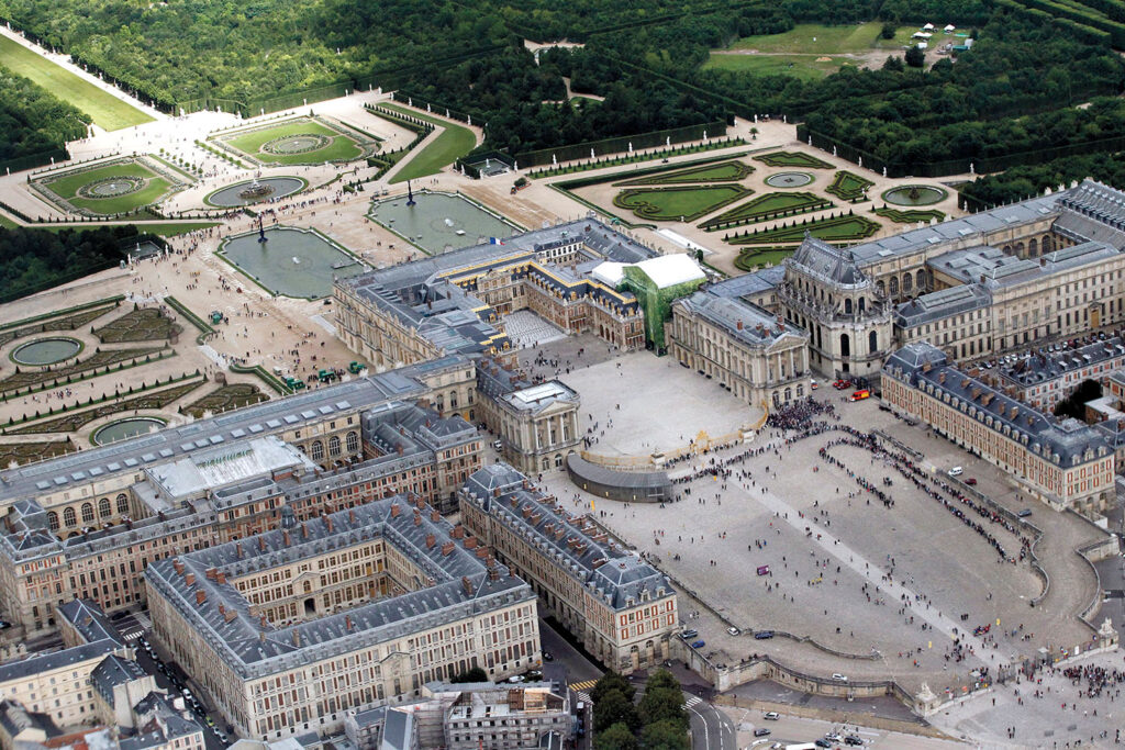 A square building adjoins Versailles' main palace