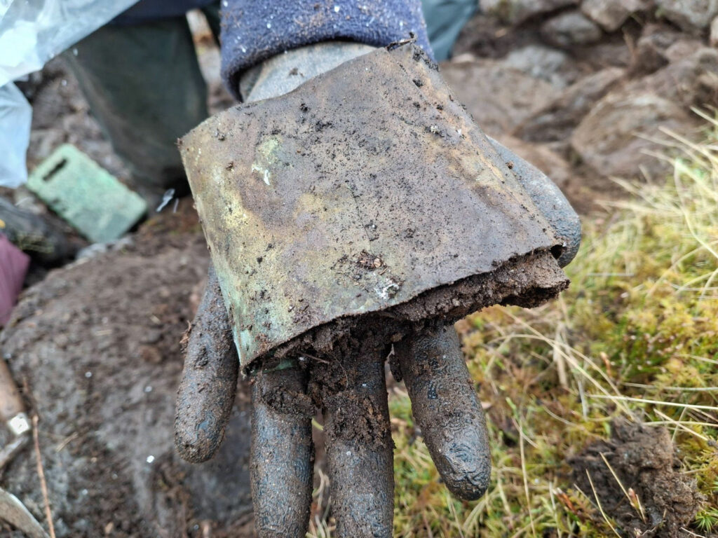 Copper alloy collar found at an illicit whisky still site in Ben Lawers National Nature Reserve, Scotland