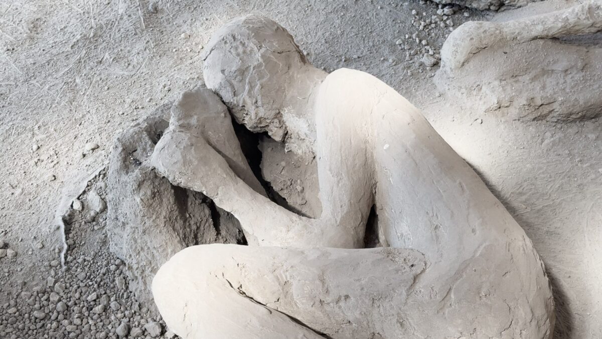 Plaster cast of victim from the Garden of the Fugitives, Pompeii, Italy