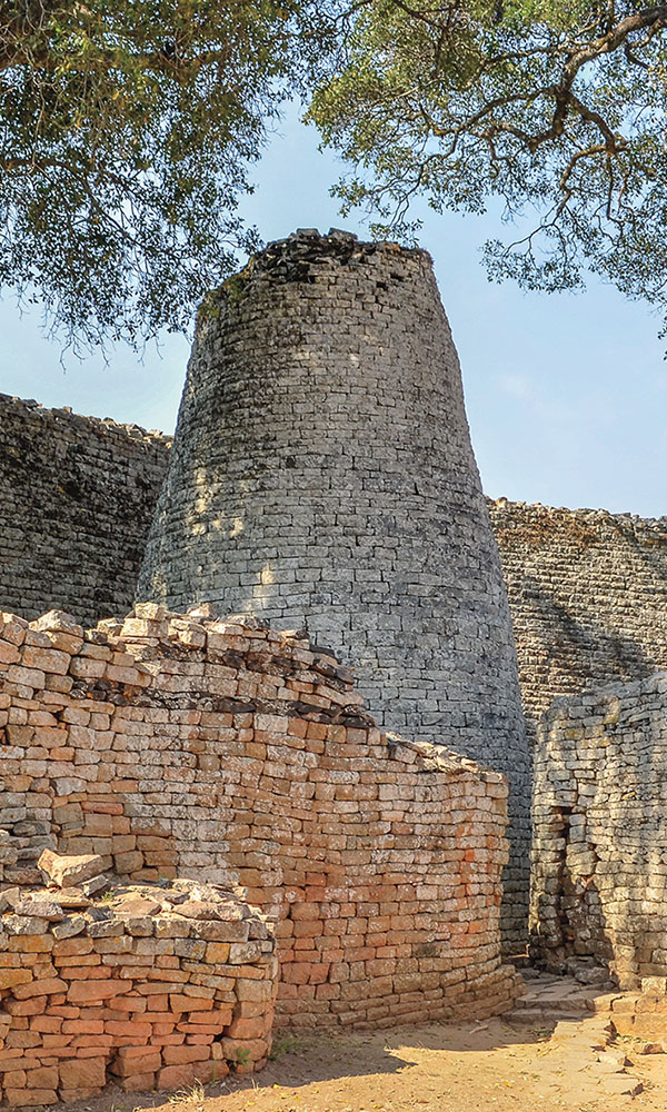 A tower measuring about 30 feet tall rises in the Great Enclosure at Great Zimbabwe