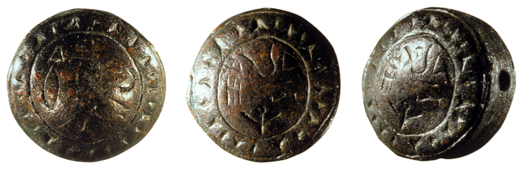 Three views of a seal written in Anatolian script