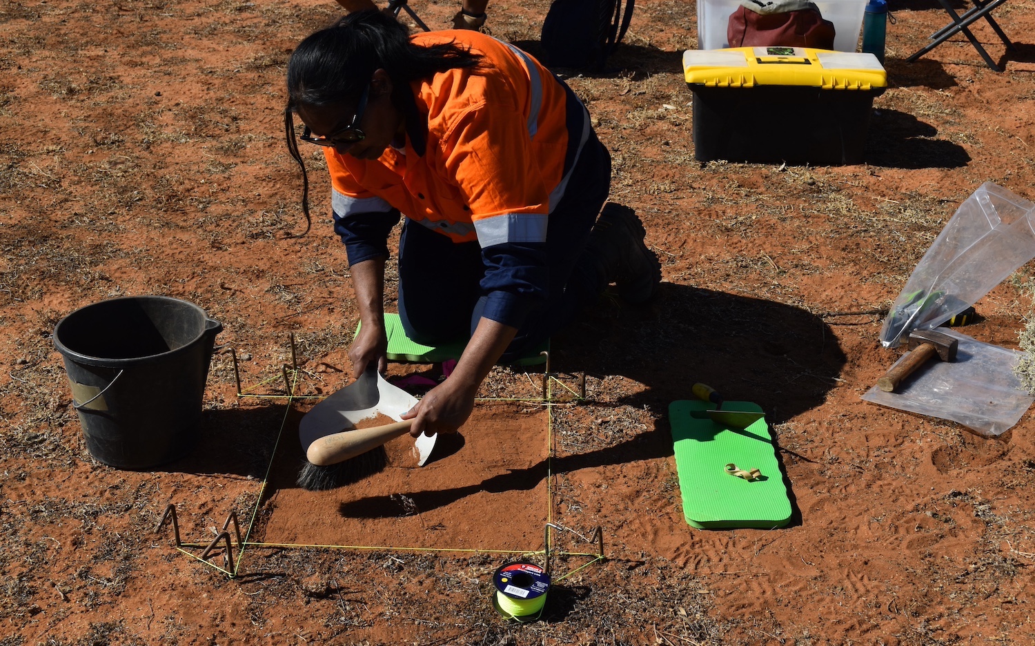 River Murray and Mallee Aboriginal Corporation member Melissa Johnson commencing the archaeological excavation at Sugarloaf Hill, Australia