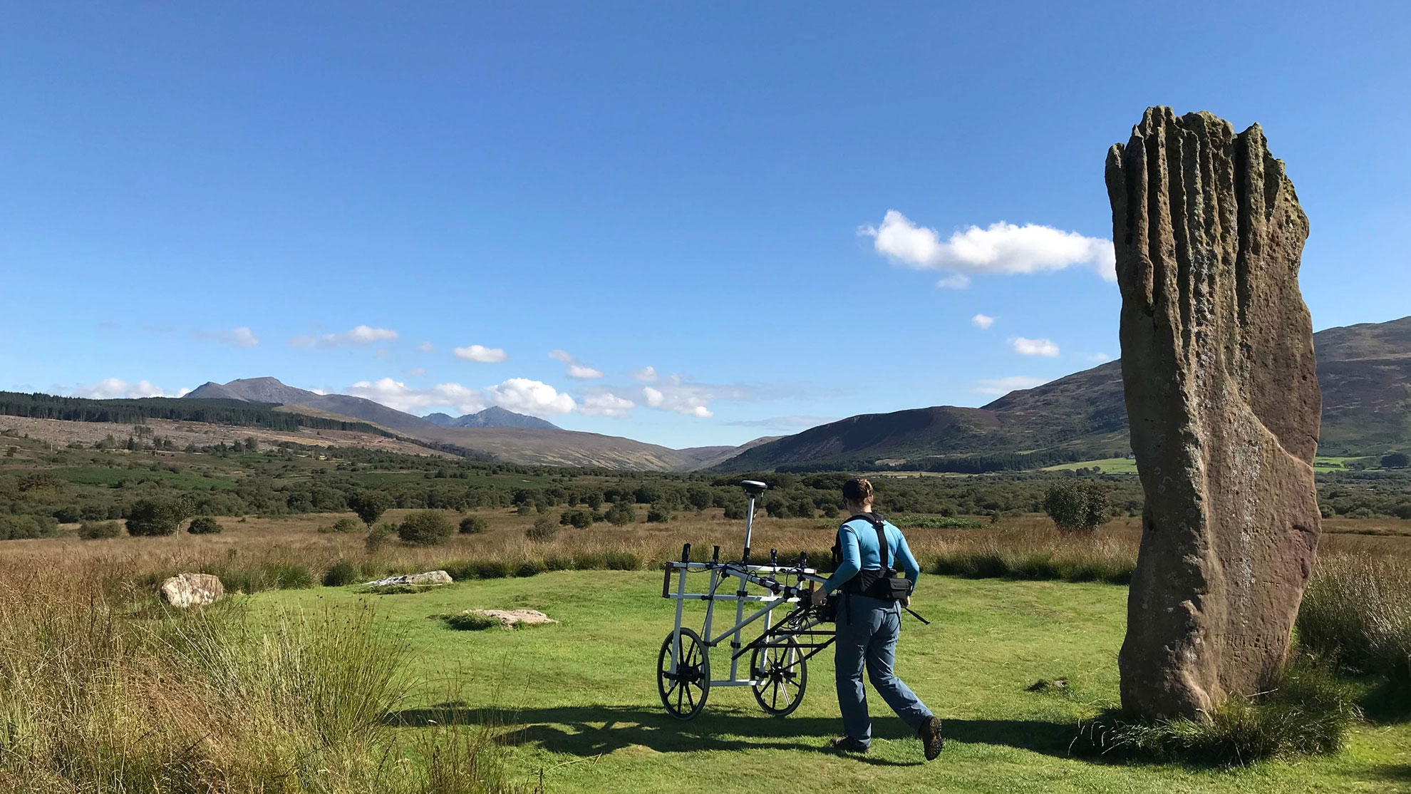 A researcher conducts a ground-penetrating radar survey at Machrie Moor on the Isle of Arran, Scotland.