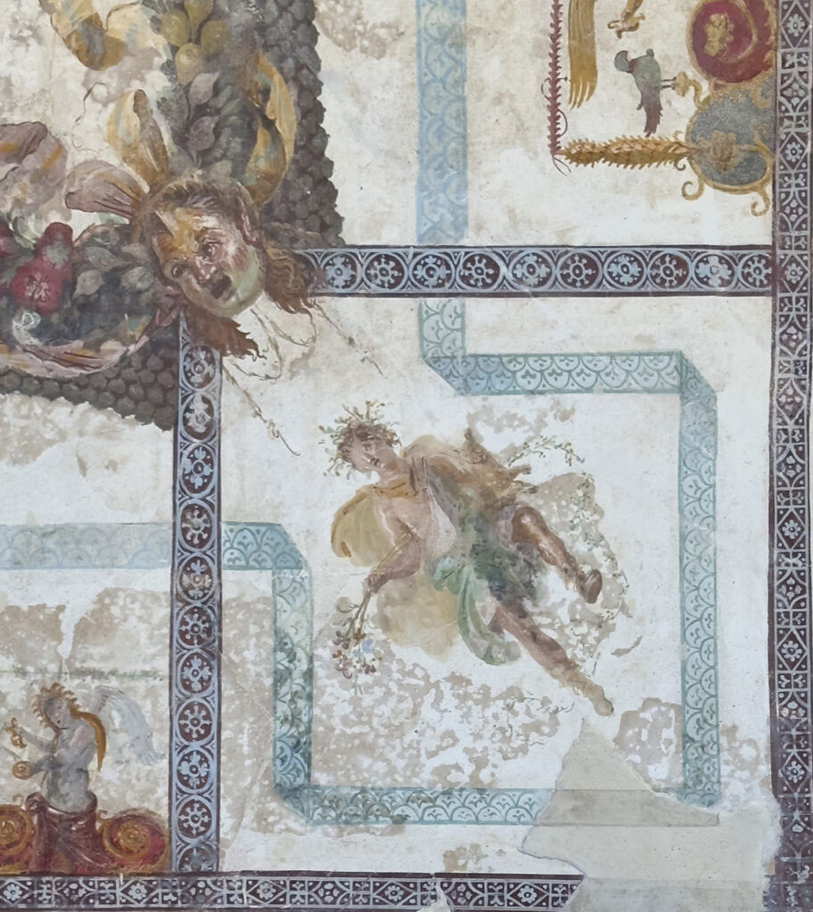 Section of ceiling fresco with theater mask and figure