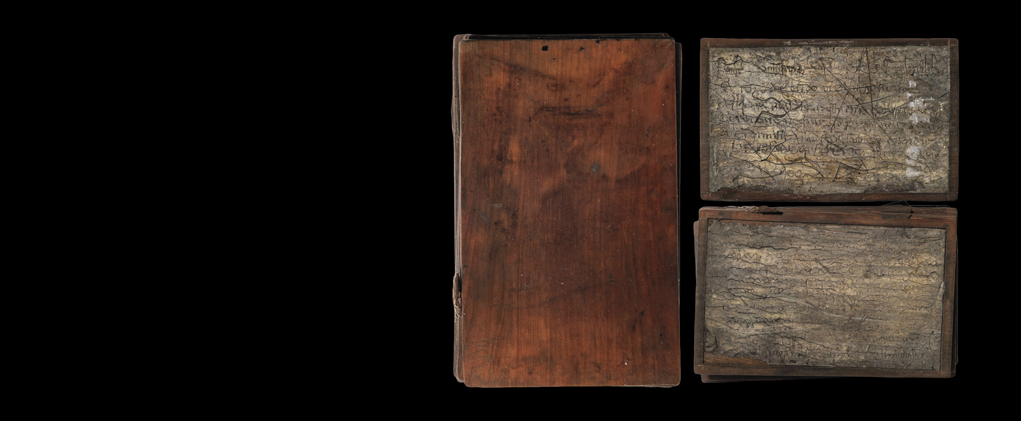 Wood notebook (left) and wax-covered pages (right)