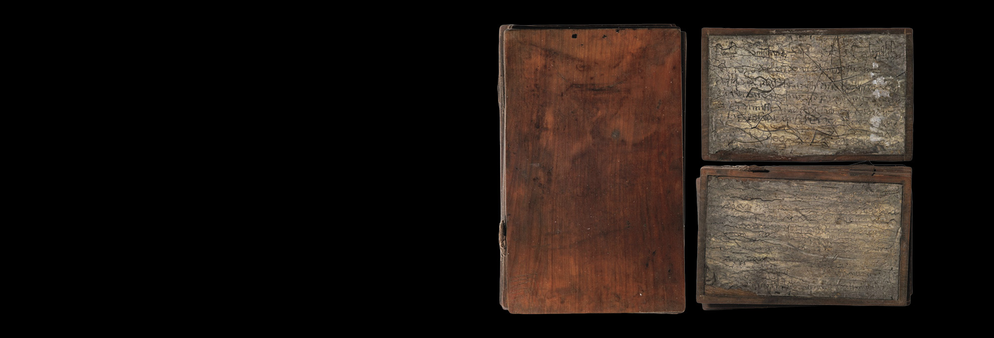 Wood notebook (left) and wax-covered pages (right)