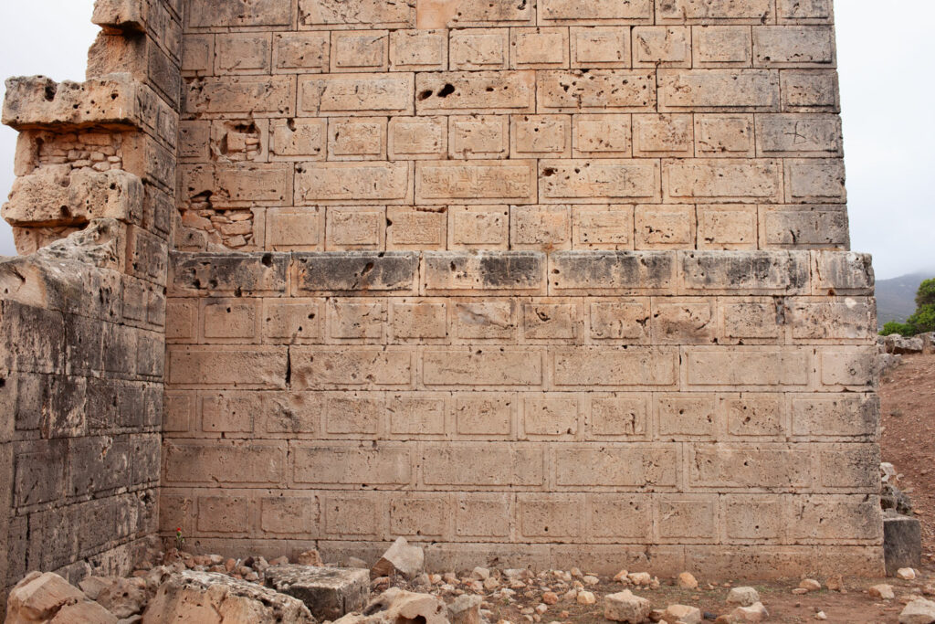 Closeup view of the north wall of the Tauchira Gate, Ptolemais, Libya