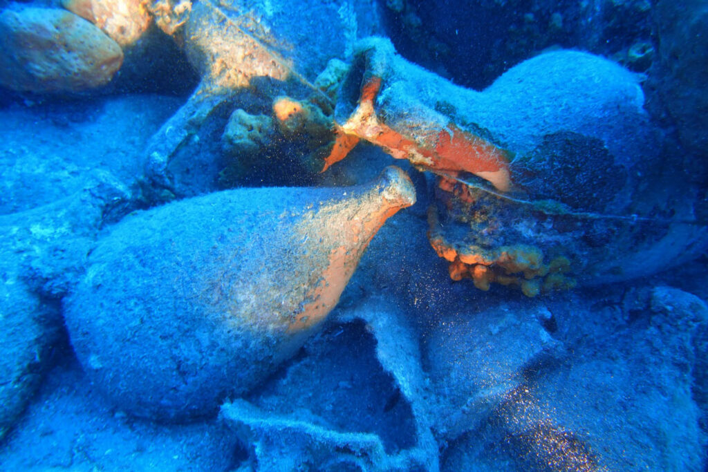 Amphoras on the ancient shipwreck off Andros, Greece