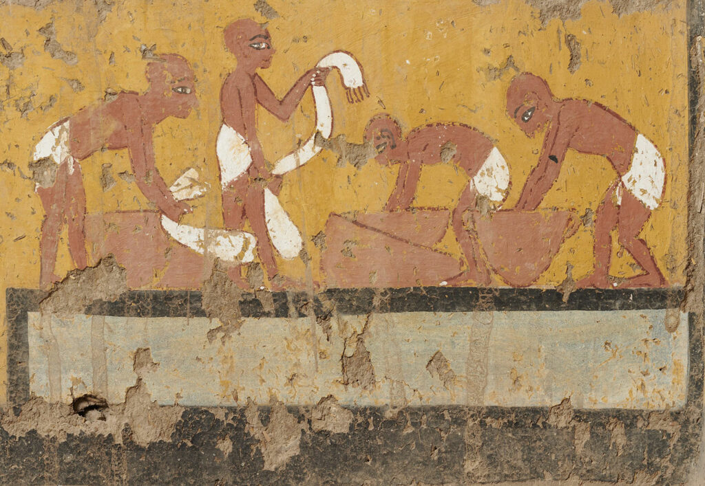 Detail of painting from Ipuy's chapel depicting men doing laundry