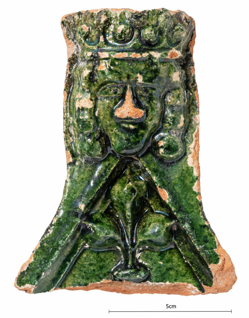 Green-glazed stove tile