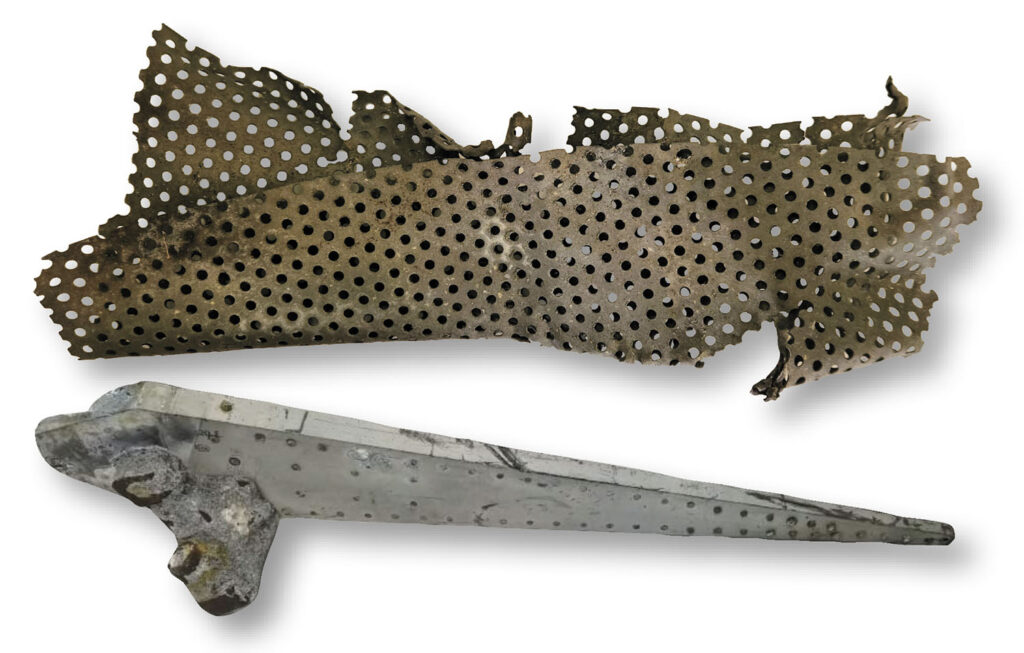 A piece of metal called a baffle (top), which twisted when a missile cratered, and part (above) of a scuttled 1950s or 1960s cruise missile